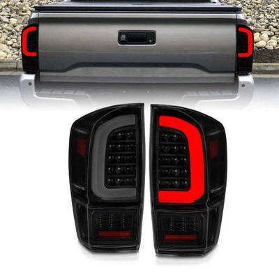ANZO 311401 fits Toyota 16-21 Tacoma LED Tail Lights - w/ Light Bar Lens Foto 1 de 4