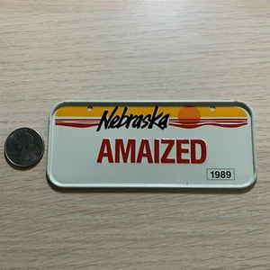1989 Nebraska Amaized Mini Bicycle Cereal Premium License Plate LP145 - Picture 1 of 2