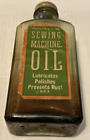 Bouteille en verre huile pour machine à coudre vintage en relief 405 sur le fond pratique États-Unis