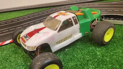 Team Losi vintage XXXT ARTR Stadium Truck 1/10 scale - Image 1 of 4