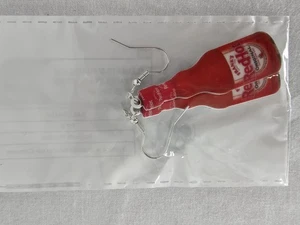 Pendientes perforados colgantes con gancho Frank's Red Hot Sauce novedad joyería alimentaria  - Imagen 1 de 1