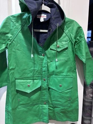 Impermeable vintage, verde y azul. La marca es Raindrops S 7 Pit Pit Is 16 pulgadas. Foto 1 de 4