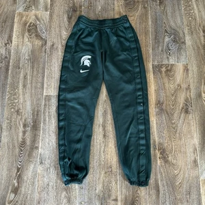 Pantaloni Nike Michigan State Spartans da uomo piccoli a strappo elite joggers - Foto 1 di 13