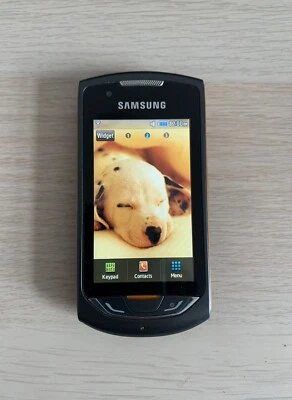 Dark Grey Orange Samsung Monte S5620 Touch Screen Smartphone - Image 1 of 4