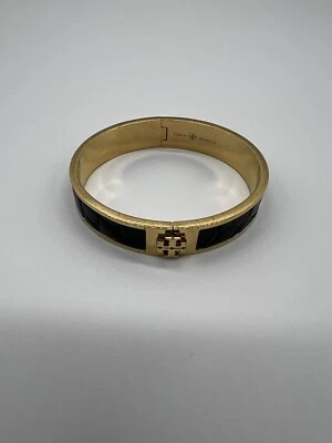 Brazalete TORY BURCH Brazalete con incrustaciones de cuero negro y logotipo dorado Tory Foto 1 de 4