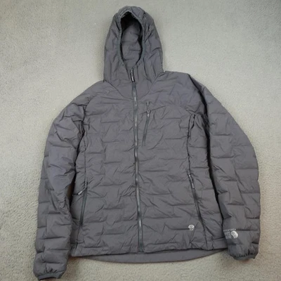 Chaqueta Mountain Hardwear elástica para mujer gris medio con capucha acolchada aislante Foto 1 de 4