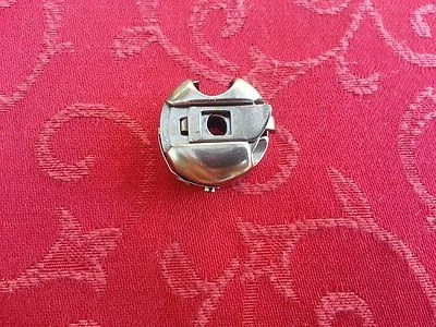 Bobbin Case Industrial Consew, 30,99,100,105,199R,210,217,230,231R,290,310,2230 - Image 1 of 2