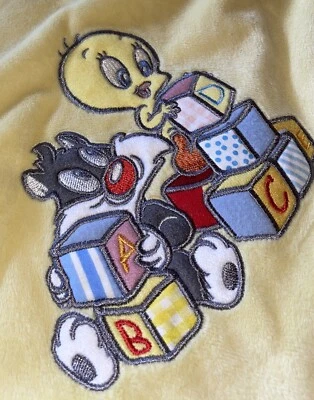 De colección Manta Baby Looney Tunes Silvestre Piolín Amarillo Suave Vellón Satinado 38x29” Foto 1 de 4