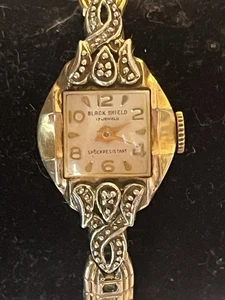 RARE 17 Jewel  Black Shield Watch Shock Resistant 10k RGP Bezel Wind Up Runs - Picture 1 of 4