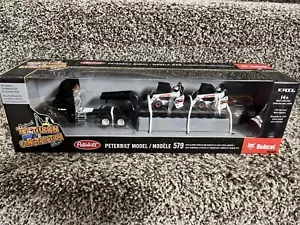 Camión de juguete nacional ERTL 1/64 Peterbilt 579 con dirección deslizante Lowboy y 2 Bobcat S76 - Imagen 1 de 4