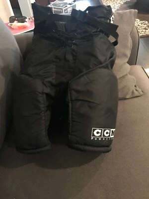 Pantalones de hockey CCM Powerline talla S 24 po 60 cm negros Foto 1 de 4