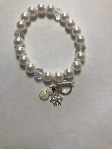Pulsera Avon muñeco de nieve y copo de nieve - Imagen 1 de 1