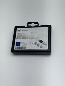 Mercedes Benz OEM Wheel Lock Set Silver – 4 of 5 (One Missing) - Bild 1 von 7