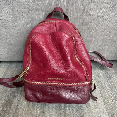 MOCHILA DE CUERO MEDIANA MICHAEL KORS RHEA BAYA CON CREMALLERA TONO DORADO Foto 1 de 4