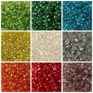 Paquete de 50 g de cuentas de semillas de vidrio transparente arco iris (AB) y brillo de 4 mm (talla 6/0) - Imagen 1 de 60