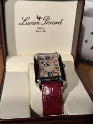 Reloj de cuarzo suizo Lucien Piccard - esfera colorida, correa de cuero rojo, con caja Foto 1 de 4