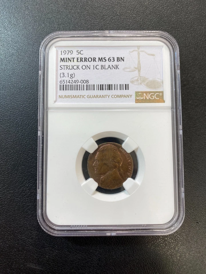 1979 NICKEL STRUCK ON CENT BLANK ERROR NGC MS-63 - UNCIRCULATED - SLABBED - 5C - Image 1 of 4