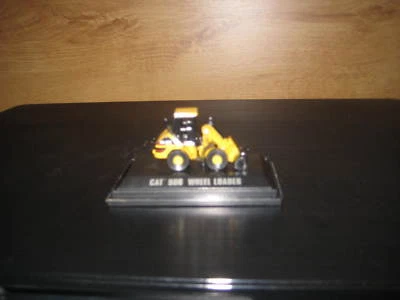 NORSCOT  CATERPILLAR  MINI WHEEL TYPE LOADER  #55422  - Image 1 of 3