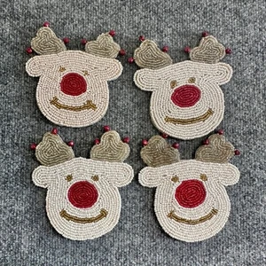 Set 4 sottobicchieri con perline natalizie renne - Foto 1 di 3