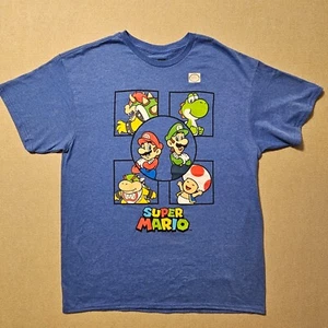 Super Mario Bros T Shirt Nintendo Ufficiale Uomo L Blu (47) - Foto 1 di 7