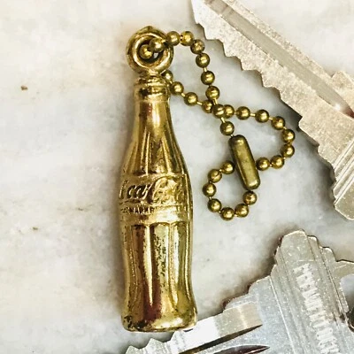 VTG Coca Cola Metal Keychain Bottle Shape Retro GoldTone 1960’s -2 inch - Image 1 of 4