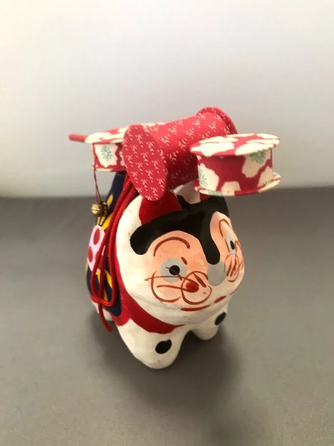 Japanese toy drum"denden taiko" on Dog-shaped Paper-mache Lucky charm - Image 1 of 4