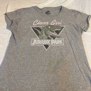 Jurassic Park World Inteligente Niña Dinosaurio Camiseta Gris Gráficos Mujer’s XL Distre - Imagen 1 de 6