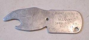 VTG JOHNNY AND BETTY AT MANNY'S CAMBRIDGE WISCONSIN SPIN YOU PAY BOTTLE Opener - Picture 1 of 2