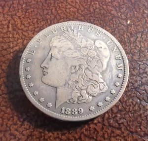 Moneda de dólar de plata O Morgan 1889 $1 marca de ceca de Nueva Orleans Estados Unidos - Imagen 1 de 2