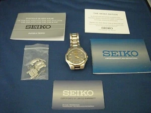 Men's Seiko V157-0AK0 Solar Watch Roman Numeral XII on Gray Face Two Tone Band - Picture 1 of 5