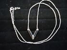 Silver Tone Necklace With Black And Silver V Shaped Pendant 28"