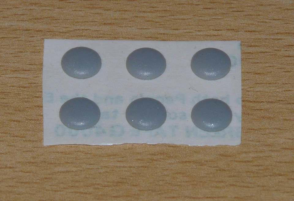 NN783 Dell INSPIRON 1525 1526 6X JUEGO DE PARACHOQUES DE GOMA PARA BISEL LCD ¡NUEVO!~ Foto 1 de 1