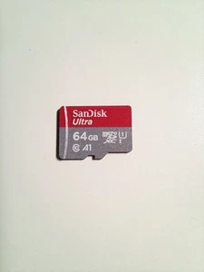 SanDisk Ultra 64Go Classe 10 UHS-I microSDXC Carte Mémoire (SDSQUNC-064G-ZN6MA) - Zdjęcie 1 z 2