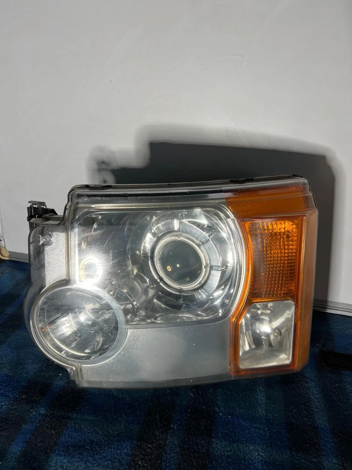 LANDROVER DISCOVERY LEFT HEADLAMP XENON, 3, L319, W/ AUTO LEVELING TYPE, P/N XBC - image 1 of 4