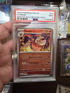 PSA 9 Flareon 013/131 (Prismatic Evolutions) Masterball Reverse Holo - Bild 1 von 2