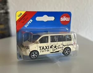 Siku modello 1070 / 1336 / 1360 VW T5 taxi grande beige * Aqua Sport Park * IMBALLO ORIGINALE - Foto 1 di 5