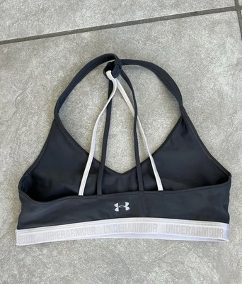 Sujetador deportivo Under Armour para mujer talla pequeña Infinity cubierto medio ajustado logotipo deletreado Foto 1 de 3