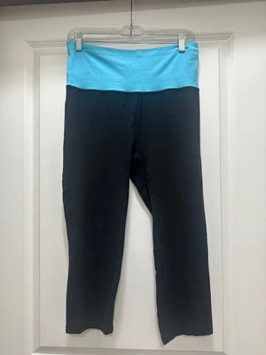 LEGGINGS GAP FIT CARPI NEGRO CON CINTURA TURQUESA MEZCLA ALGODÓN TALLA MEDIANA Foto 1 de 2