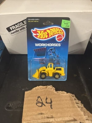 1986 Mattel Hot Wheels Wheel Loader #1173 Workhorses W/CAT Logo, Yellow Hubs - Image 1 of 4