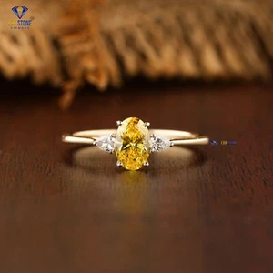 0.78 TDW Yellow Oval And Pear cut Labgrown Diamond Ring 18k Yellow Gold - Foto 1 di 5