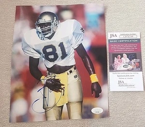 FOTO FIRMADA POR TIM BROWN 8X10 NOTRE DAME LUCHANDO IRLANDESA JSA AUTENTICADA #CB76788 - Imagen 1 de 3