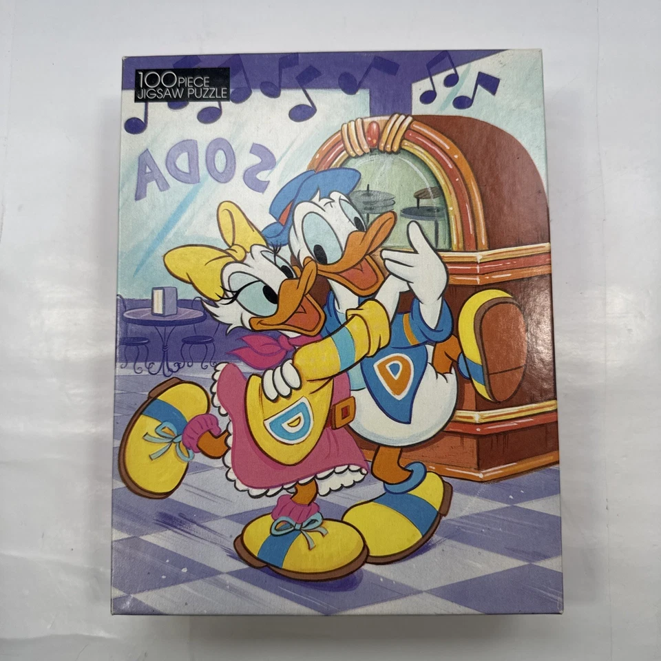 Rompecabezas DORADO 100 piezas para niños Disney Donald Daisy Duck Dancing Soda Shop Foto 1 de 4