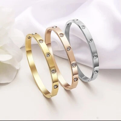 gold plated over stainless steel bracelate - Image 1 of 4