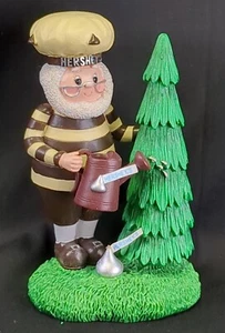 Figura de Kurt Adler Hershey 2004 hombre riego pino de Navidad - Imagen 1 de 5