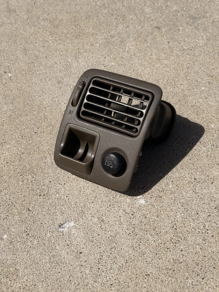 Toyota Corolla 1998-2002 ventilación lateral del conductor y portamonedas. OE✅ Foto 1 de 2