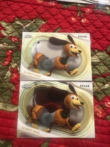 2025 Topps Disney Chrome Toy Story Slinky Dog Buy One Get One Free - Bild 1 von 3