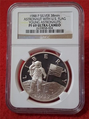 1988-P SILVER "YOUNG ASTRONAUTS" NGC PF 69 38mm ASTRONAUT W/ U.S. FLAG  #MF-5231 - Image 1 of 2