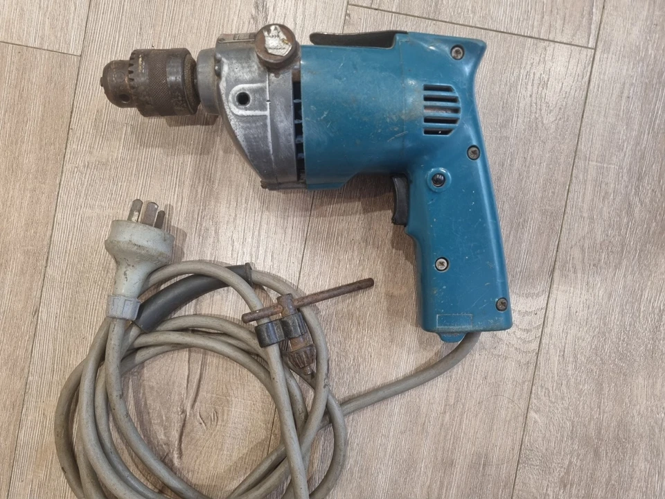 Taladro Makita 350W Carcasa de acero de alta resistencia Destornillador de impacto Llave de portabrocas eléctrico con cable Foto 1 de 4