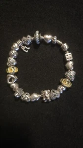 Pandora Armband mit 21 Charmelementen, Länge 21 cm - Bild 1 von 7