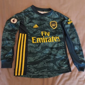 Arsenal 2019/20 Khaki Green Goalkeeper Shirt, Leno 1, Size 7 to 8 Years - Picture 1 of 5